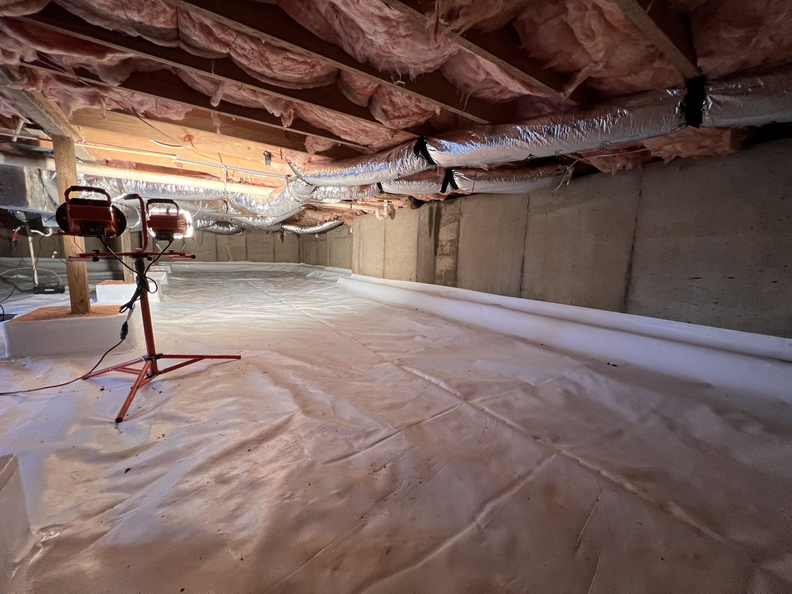 IMG_2801 crawl-space-vapor-barrier-with-lights-illuminating-area